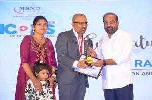 Dr. Mohana Rao Patibandla receiving Times ICONs of Healthcare 2026 award from Andhra Pradesh Health Minister Satya Kumar Yadav