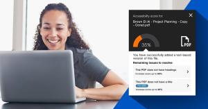 Instructor smiling at laptop with digital interface showing PDF accessibility score of 35%