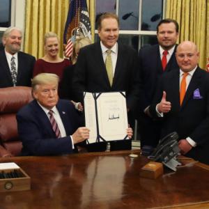 Marty Irby and President Donald Trump at the signing of the PACT Act in November