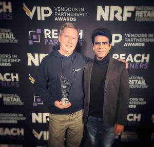 Tony Popov, Founder & CEO, and Vinkal Chadha, Global Managing Partner & CEO APAC, at the VIP Awards ceremony in New York