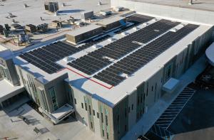 Aerial view of a 204 kW commercial rooftop solar array installed by The Purdue Research Park solar contractor Emergent Solar Energy at the Subaru of Indiana Automotive plant in Lafayette, Indiana.