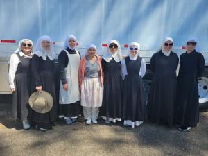 all 8 of the sisters of the valley lined up in wardrobe before the first day of filming