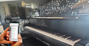 A PNOmation 4 player piano and trumpet system in home