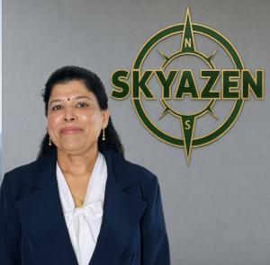 Director of SKYAZEN standing in front fo the company logo on a wall