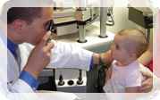 Dr Examining young boys eyes Chester County Eye Care Clompus, Reto & Halscheid Vision Associates