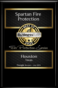 Plaque for Spartan Fire Protection, awarded Best of Business Rate 2025 for Fire Protection Services in Houston, Texas. Appears elegant with gold accents.