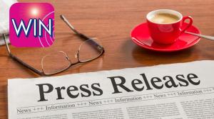 WIN PC App Press Release Photo with Coffee Cup and Newspaper