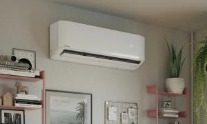 Wall-mounted MRCOOL DIY ductless mini split indoor air handler installed in a residential living room