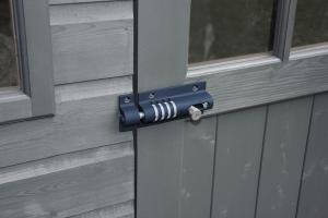 Squire's Combi Bolt 4 combination lock securing a shed