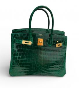 Hermès Birkin 30 Emerald Shiny Niloticus Crocodile Handbag Lena of Goldpawnership sold for a record $38,999. Goldpawnership also sells Louis Vuitton, Chanel, Hermès, Prada, Gucci, Saint Laurent, Goyard, Tiffany & Co., Tom Ford and Celine brands.