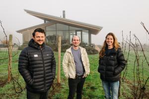 L'Angolo Estate Announces Leadership Promotions: Tracy Kendall Steps into Full-Time Winemaking Role, Galen Hegarty Named Estate Director. Photo of Owner Chase Renton with Tracy Kendall and Galen Hegarty at L'Angolo Estate in the Willamette Valley.