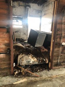 Storm surge damage inside the horse barn at Ol' Freetown Farm