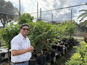 Noah Aguilar, founder of Everglades Farm, at the Florida-based nursery where rare tropical fruit trees and plants are cultivated for home growers nationwide.