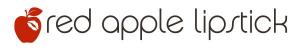 Red Apple Lipstick logo featuring a red apple icon with a leaf on the left and the brand name “red apple lipstick” in lowercase letters to the right on a white background.