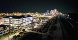 Night exterior of Ocean Escape Boardwalk Oceanfront.