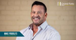 Mike Fridolfs headshot with the EDC logo and his name and title as a board member.