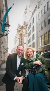 Sascha Ernst Dietrich speaking with a conference participant in the historic city center of Dresden, Germany, as part of the peace and dialogue project EuroCity 2606.