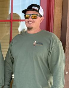 Owner of Brown’s Garage Door smiling confidently representing trustworthy and professional service