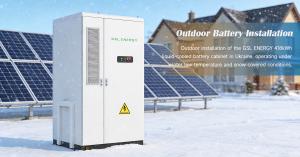 Outdoor installation of the GSL ENERGY 418kWh liquid-cooled battery cabinet in Ukraine, operating under winter low-temperature and snow-covered conditions.