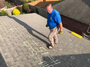 Owner Dave Laizure during an adjuster meeting