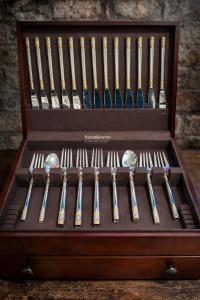 This sterling silver set is an example of the sets that can be worth over $5000. They also buy gold jewelry and bullion and designer handbags and luxury watches. They will also provide loans using these assets as collateral.