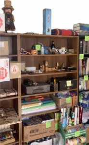 Bookshelves full of organized and labelled objects