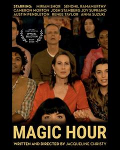 woman sitting in an audience of people