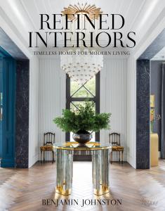 Cover of "Refined Interiors: Timeless Homes for Modern Living" by Benjamin Johnston, published by Rizzoli, featuring a grand foyer with statement chandelier and round center table
