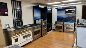 View of large huge inventory of refrigerators, ranges, ovens, cooktops, dishwashers, washers, dryers, and other home essentials