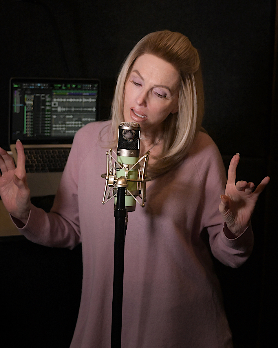 Singer-songwriter Leah Soderblom, known artistically as Leayh In Light, recording in her home studio.