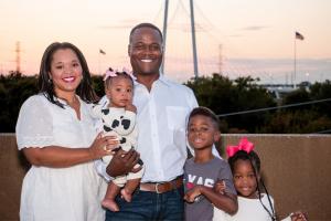Sholdon Daniels pictured with his wife and children.