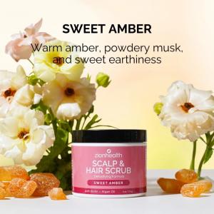 Zion Health Deep Cleansing Scalp & Hair Scrub Sweet Amber displayed with floral elements and amber resin, illustrating the warm, earthy scent profile of the exfoliating scalp treatment.
