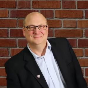 Headshot of Jeff Dulmage, Real Estate Broker and Partner at Level 5 Capital.