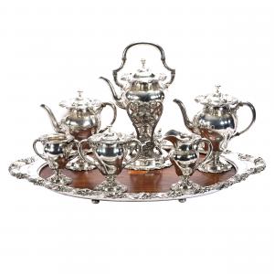 Magnificent 7-piece Mauser sterling silver matching tea service featuring an elaborate design, with each piece marked Mauser #1760. Weighing in at 19 pounds. Estimate: $10,000-$15,000