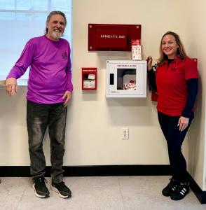 Crissy+Chris-Co-Founders Displaying Cabinets at Dowdy Community Park