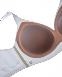 Close-up of the inside of a Huug bra showing the built-in cup construction.
