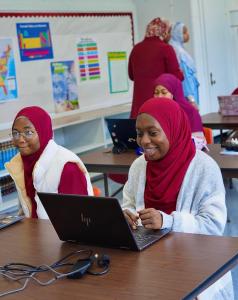 Students in Noor Academy classroom.
