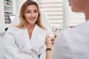 Patient sitting with a licensed medical professional discussing a tailored PRP therapy plan at YouShine Medspa.