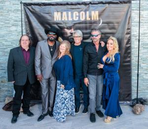 Hollywood celebrities pose for a photo at Encantame Resorts red carpet event