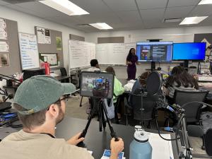 Tulsa Community College students working together on multimedia coverage for the TCC Connection’s Route 66 centennial project.