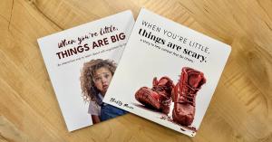 Cover of When You’re Little, Things Are Scary by Shelby Moore, shown alongside When You’re Little, Things Are Big, featuring minimalist designs with a child portrait and red boots symbolizing fear, perspective, and emotional growth.
