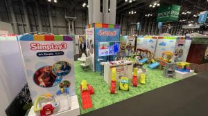 A wide shot showing products in Simplay3's booth at New York Toy Fair.