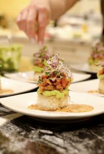 Chef Teresa Hansen puts the finishing touches on an entree.