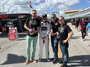 Broadstreet Infamous founders with NASCAR Craftsman Truck Series driver Tanner Gray on Pit Road