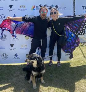 Ryan McCartney and his partner Jessica McGannon with their dog Charley, all dressed as butterflies during The Grand Butterfly Gathering in Jackson, WY, in June 2025. Photo: Ryan McCartney/Jessica McGannon.