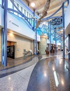 Interior of the Kankakee Welcome Center, with multicolor terrazzo and a decorative traditional windmill. 