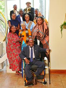 International delegation at the home of Dr. Francis Chishala of Zambia (front row) for award presentation - photo provided by Godfrey Atsing'a
