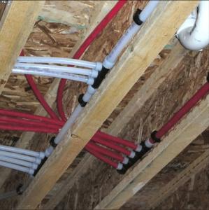 Whole house PEX repiping installation in Pasadena TX home replacing old galvanized pipes with Uponor PEX-A water lines