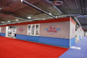 Joe's Garage signage at AAPEX