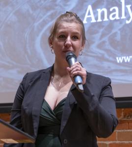 Woman speaks to a crowd in Prescott Arizona